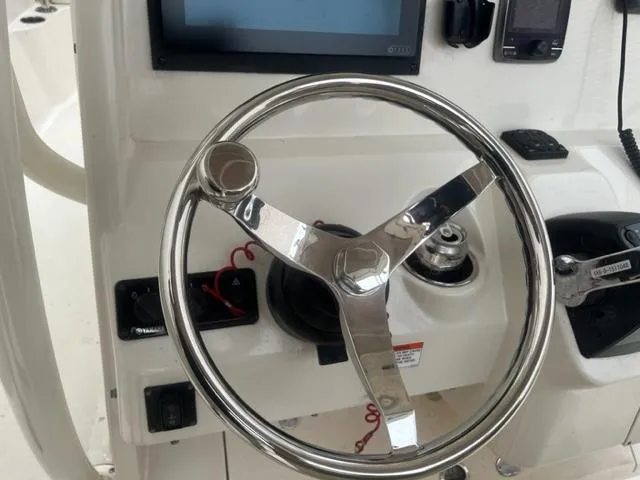 Slide: The Image of 2015 Sailfish 320 CC Helm Wheel - 26