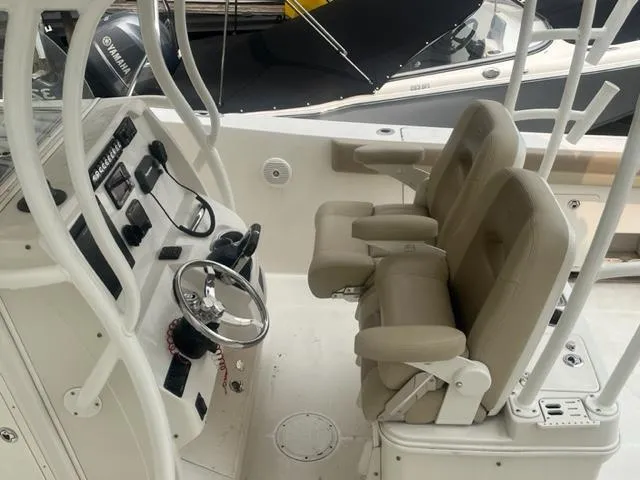 Slide: The Image of 2015 Sailfish 320 CC Helm Seats - 8