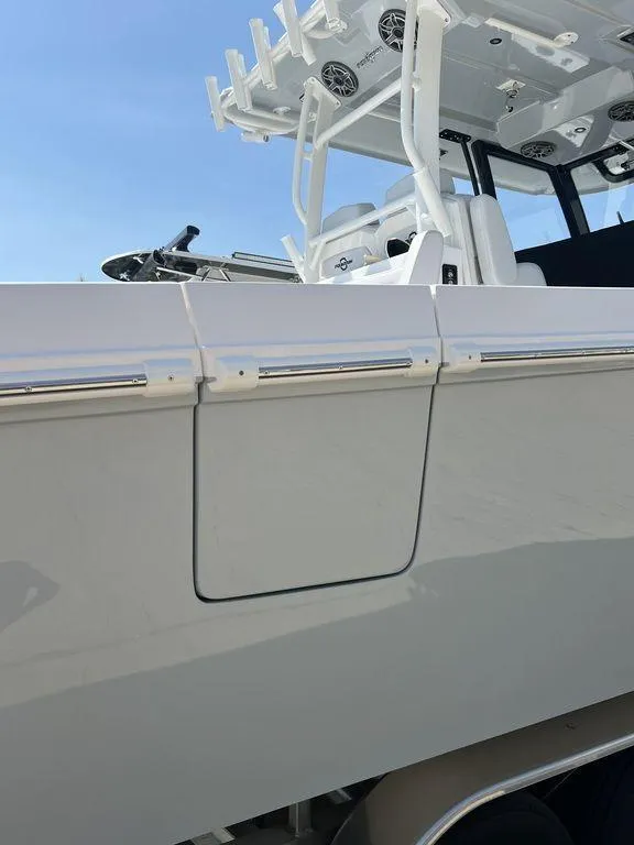 Slide: The Image of 2024 Fountain 38 TE boat, sleek white exterior, modern design, and advanced features. - 14