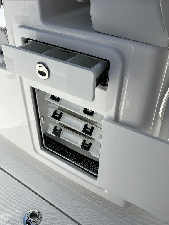 Slide: The Image of 2024 Fountain 38 TE boat storage compartment with lockable drawers. - 32