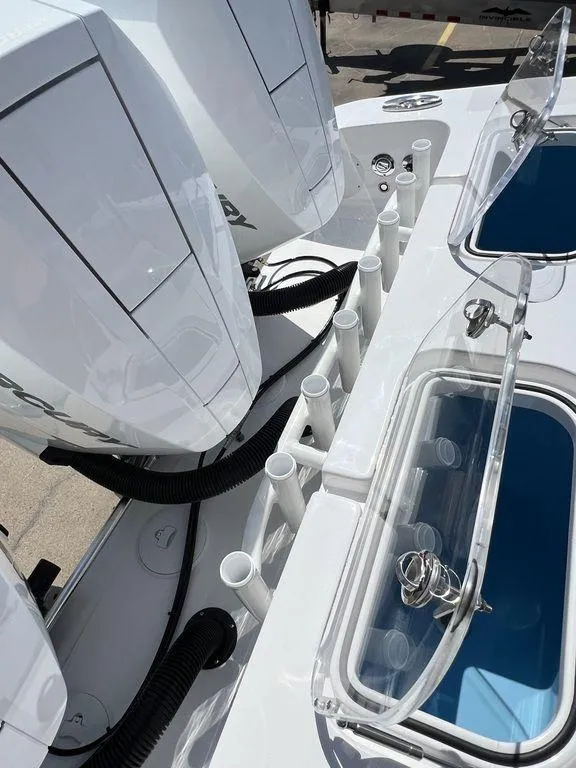 Slide: The Image of 2024 Fountain 38 TE boat with dual engines and rod holders. - 50