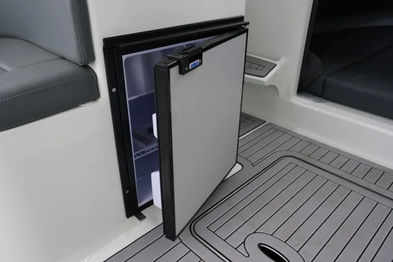 Slide: The Image of 2023 Extreme Boats 745 Game King interior with open mini fridge on deck. - 20