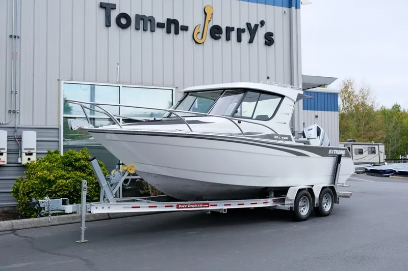 Slide: The Image of 2023 Extreme Boats 745 Game King on trailer at Tom-n-Jerry's dealership. - 3