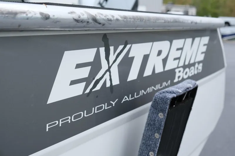Slide: The Image of Close-up of 2023 Extreme Boats 745 Game King, showcasing "Proudly Aluminium" branding. - 7