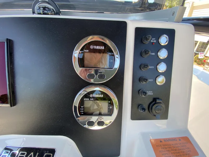 Slide: The Image of Dashboard of 2026 Robalo R200 Center Console with Yamaha gauges and control panel. - 11