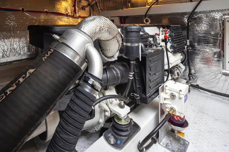 Slide: The Image of Engine room of a 2018 Cruisers Yachts 45 Cantius with Volvo Penta components. - 32