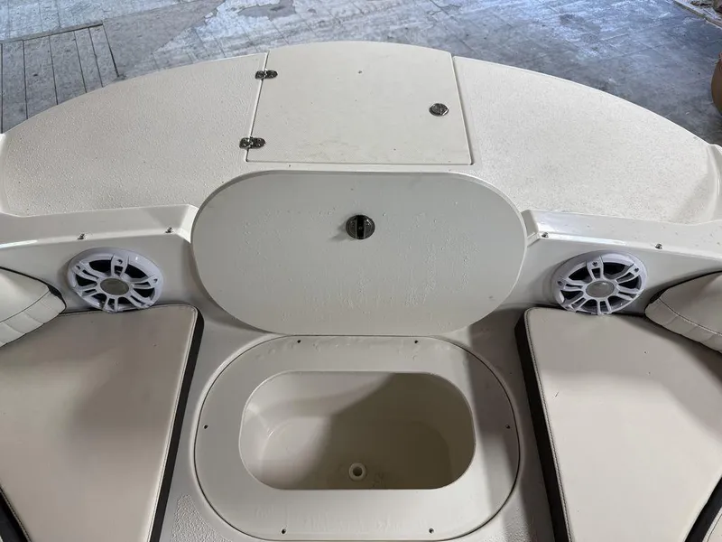 Slide: The Image of 2024 Stingray 192SC boat interior with speakers and storage compartment. - 24