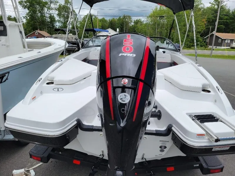 Slide: The Image of 2024 Tahoe 210 S boat with 150 Pro motor, rear view. - 12