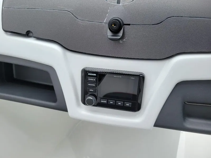 Slide: The Image of Dashboard of 2024 Tahoe 210 S boat with control panel and display. - 4