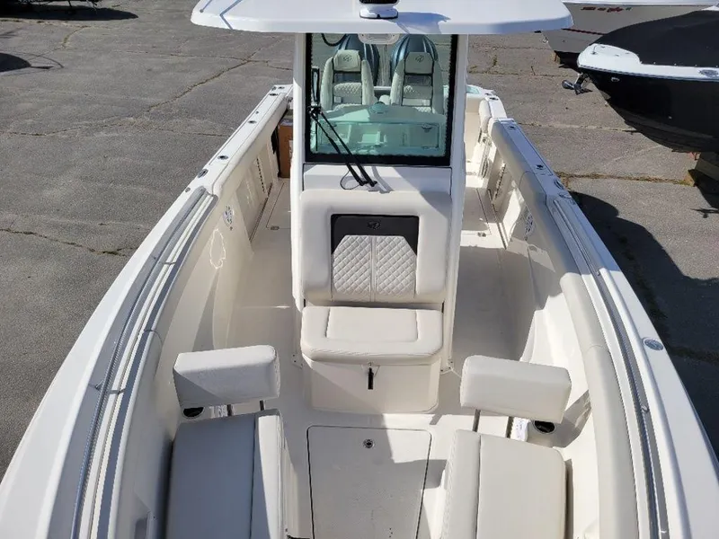 Slide: The Image of 2024 Sailfish 272 CC center console boat with spacious seating and modern design. - 6
