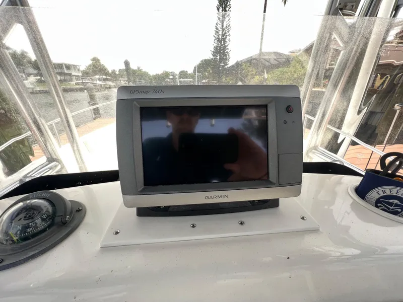 Slide: The Image of Garmin GPS on 2004 Century 2000 Center Console boat dashboard. - 10