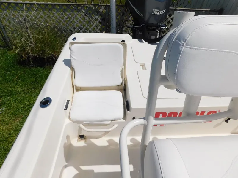 Slide: The Image of White seating on 2016 Skeeter 240SX boat with Yamaha 300 engine. - 7