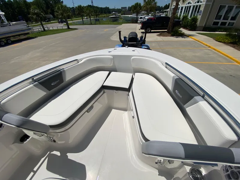 Slide: The Image of 2026 Robalo R200 Center Console boat interior with spacious seating and modern design. - 16