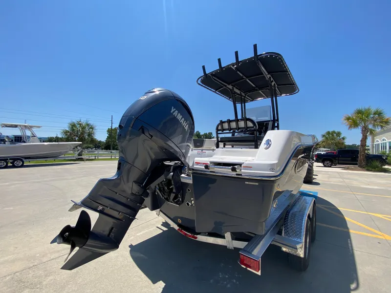 Slide: The Image of 2026 Robalo R200 Center Console boat with Yamaha outboard motor on trailer. - 3