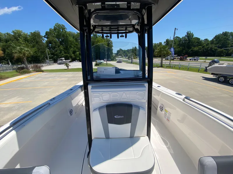 Slide: The Image of 2026 Robalo R230 Center Console boat, featuring sleek design and spacious seating. - 22