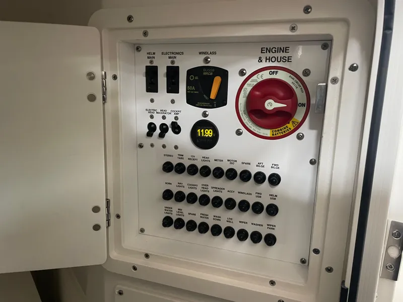 Slide: The Image of Control panel of 2024 Pursuit DC 246 Dual Console boat. - 16