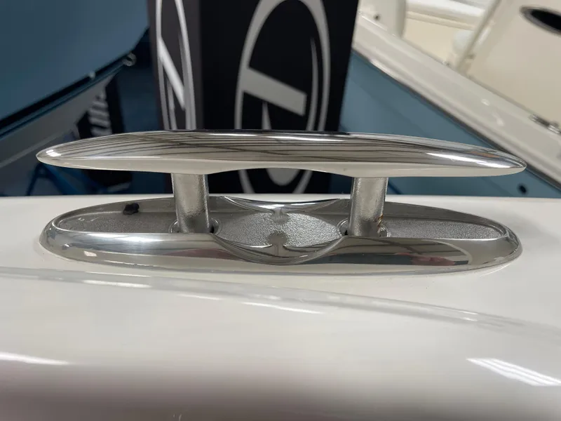 Slide: The Image of 2024 Pursuit DC 246 Dual Console boat cleat close-up. - 20