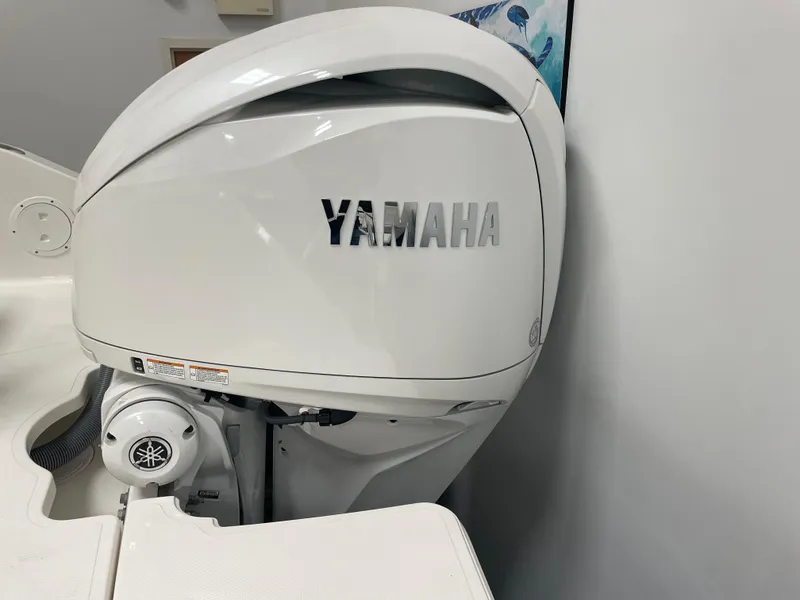 Slide: The Image of 2024 Pursuit DC 246 Dual Console with Yamaha outboard motor. - 29
