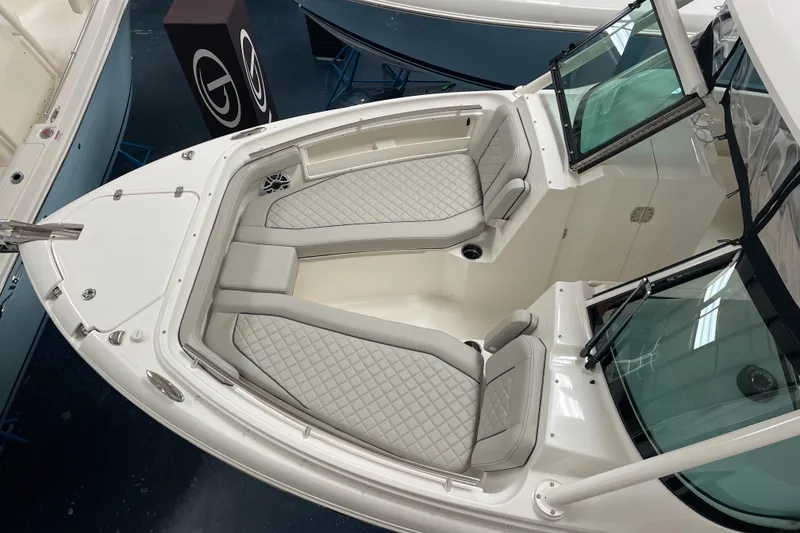 Slide: The Image of 2024 Pursuit DC 246 Dual Console boat with spacious bow seating. - 30