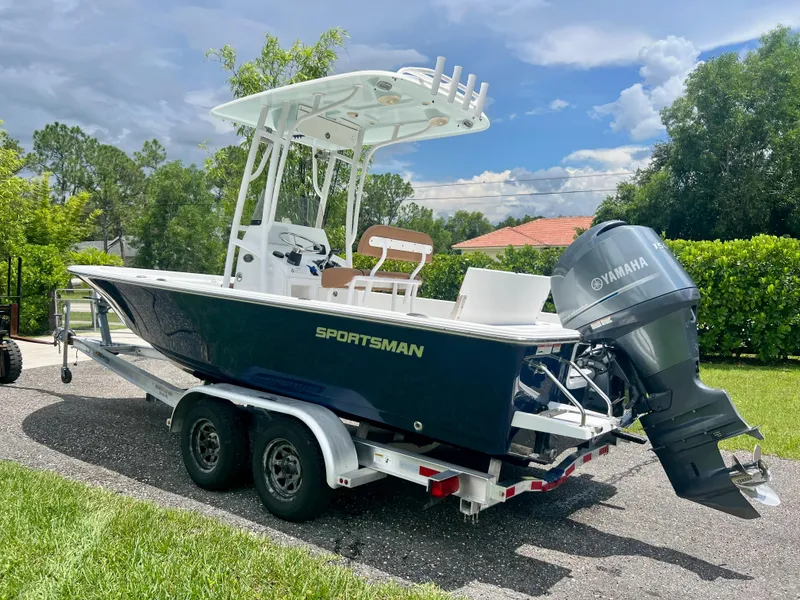 Slide: The Image of 2013 Sportsman 227 MASTERS boat on a trailer with Yamaha outboard motor. - 11