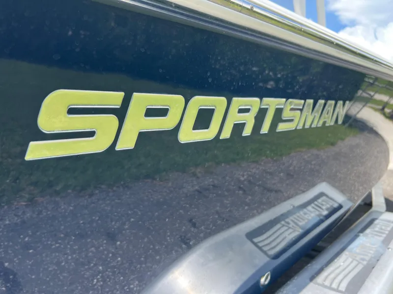 Slide: The Image of Close-up of 2013 Sportsman 227 Masters boat logo. - 13