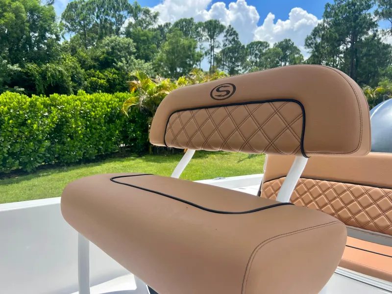 Slide: The Image of Sportsman 227 MASTERS 2013 boat seat with tan upholstery and diamond stitching. - 18
