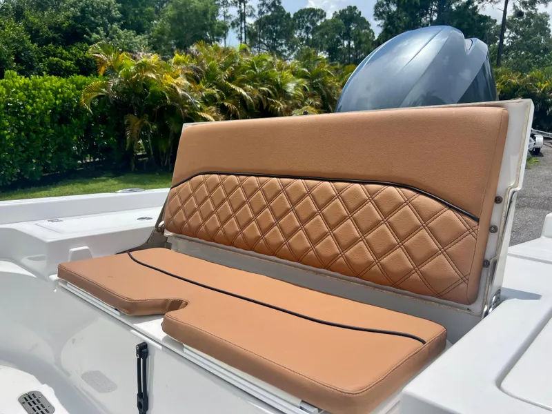 Slide: The Image of 2013 Sportsman 227 MASTERS boat with tan diamond-stitched seating. - 19