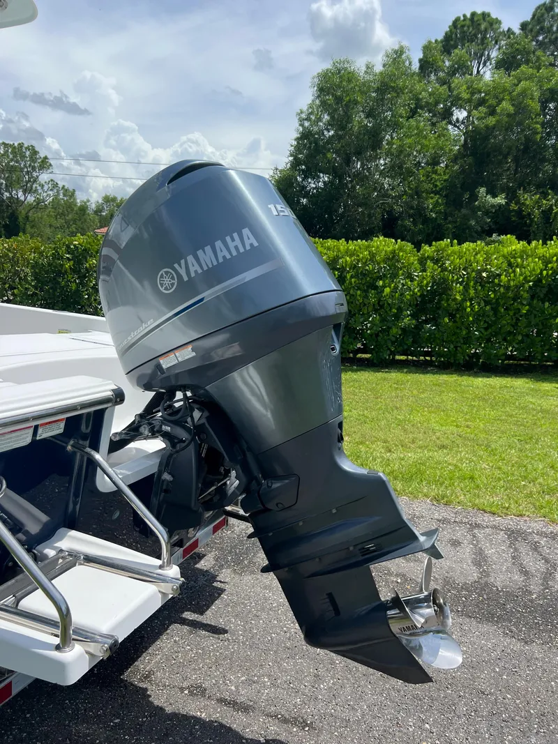 Slide: The Image of 2013 Sportsman 227 Masters boat with Yamaha outboard motor. - 27