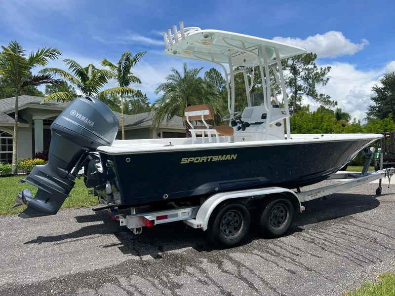 Slide: The Image of 2013 Sportsman 227 Masters boat on a trailer with Yamaha outboard motor. - 9