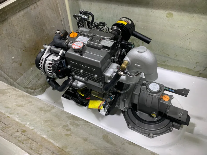 Slide: The Image of 2024 Schionning Arrow 1280 S engine compartment with visible engine components. - 13