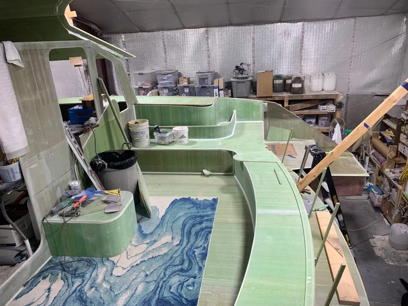 Slide: The Image of Schionning Arrow 1280 S 2024 model under construction in a workshop. - 35