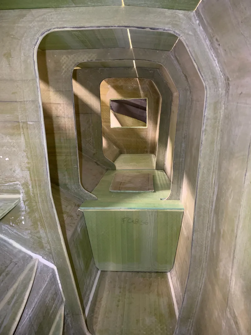 Slide: The Image of Interior structure of 2024 Schionning Arrow 1280 S catamaran under construction. - 42