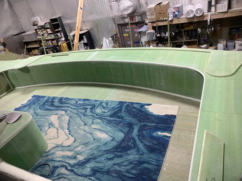 Slide: The Image of 2024 Schionning Arrow 1280 S under construction in a workshop. - 44