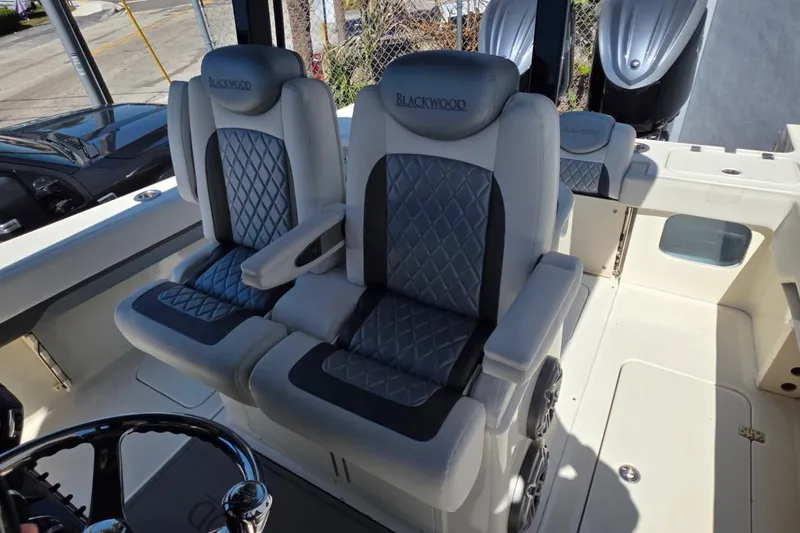 Slide: The Image of 2024 Blackwood 290 boat interior with luxurious seating and modern design. - 10