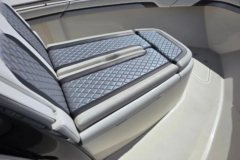 Slide: The Image of 2024 Blackwood 290 boat with luxurious quilted seating in a sleek design. - 3