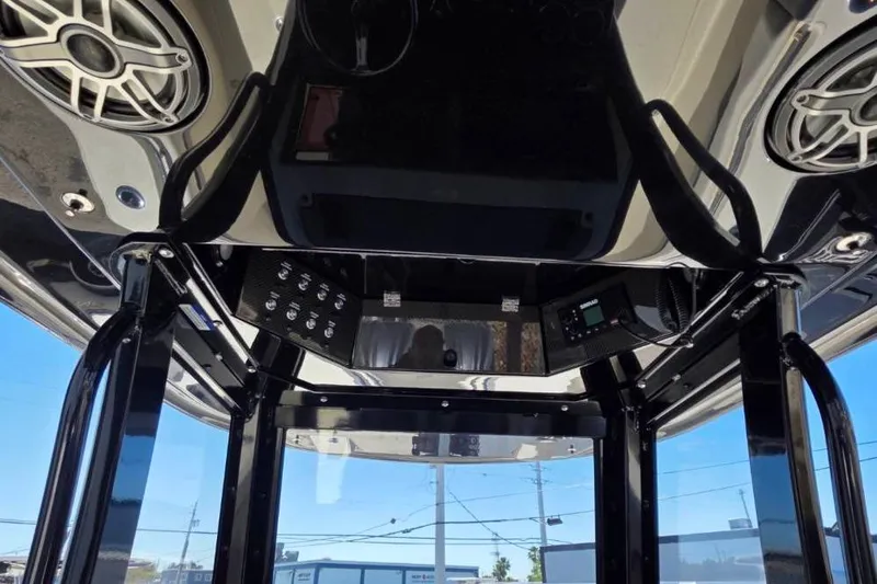 Slide: The Image of Interior view of 2024 Blackwood 290 boat with speakers and control panel. - 7