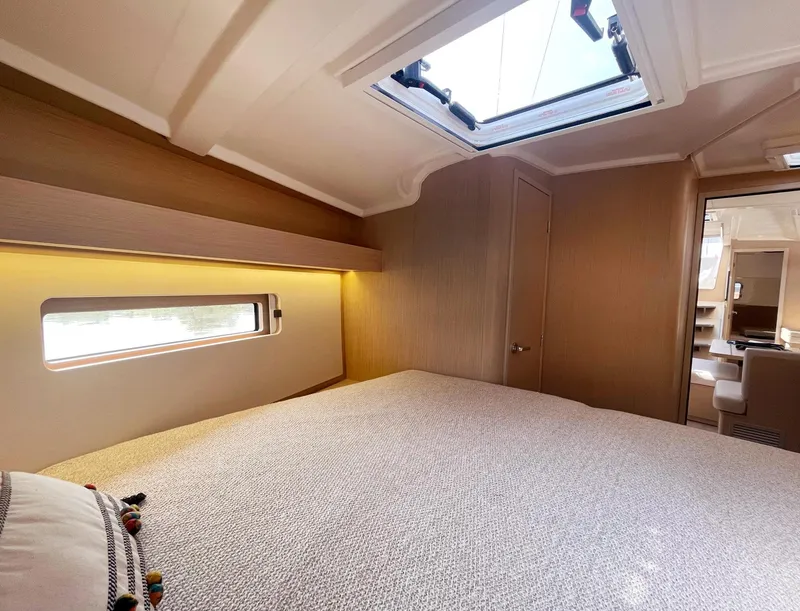 Slide: The Image of 2026 Beneteau Oceanis 40.1 cabin interior with skylight and modern design. - 13