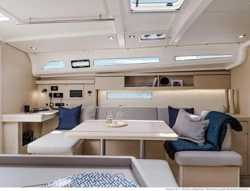 Slide: The Image of Luxurious interior of 2026 Beneteau Oceanis 40.1 yacht with modern seating and skylights. - 25