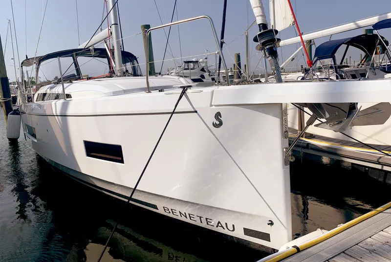 Slide: The Image of 2026 Beneteau Oceanis 40.1 sailboat docked at marina, side view. - 3