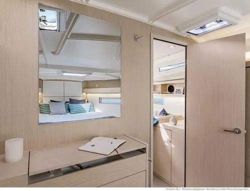 Slide: The Image of Interior of 2026 Beneteau Oceanis 40.1 yacht, featuring modern design and cozy cabin space. - 32