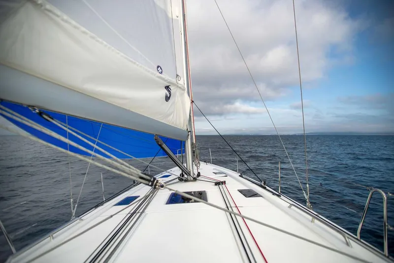 Slide: The Image of 2026 Beneteau Oceanis 40.1 sailing on open sea under cloudy skies. - 4