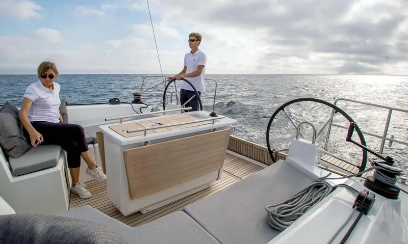 Slide: The Image of 2026 Beneteau Oceanis 40.1 sailboat on open sea, featuring spacious deck and modern design. - 5