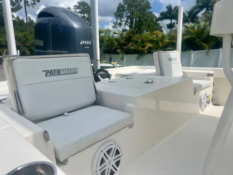 Slide: The Image of 2020 Pathfinder 2200 TRS boat interior with Yamaha 200 engine. - 11