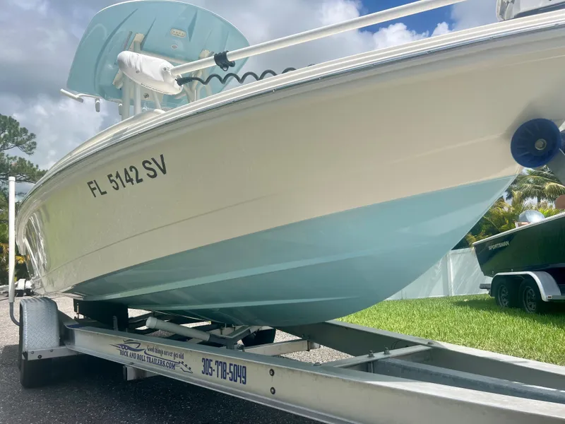 Slide: The Image of 2020 Pathfinder 2200 TRS boat on trailer, side view with registration number FL 5142 SV. - 6