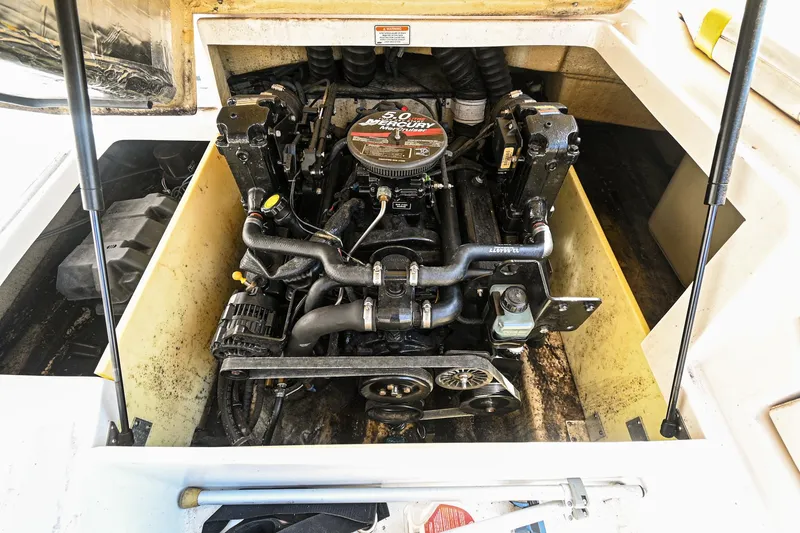 Slide: The Image of 2006 Regal 2000 Bowrider engine compartment with MerCruiser engine. - 24