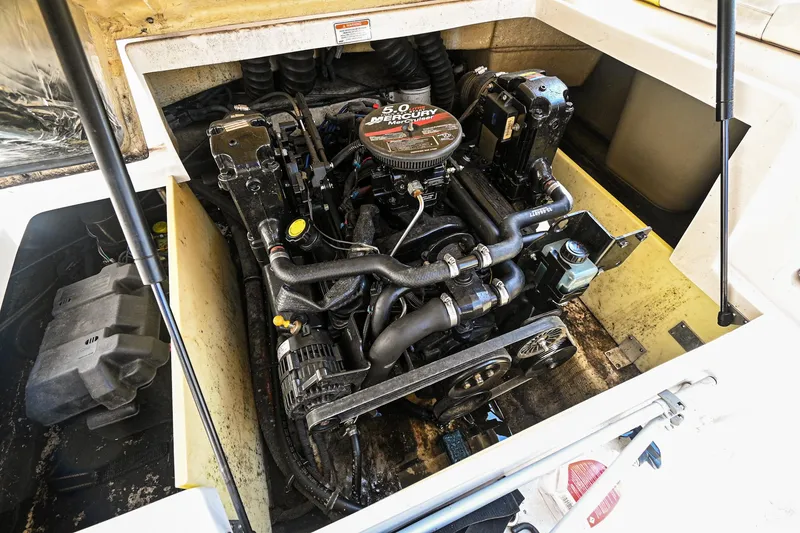 Slide: The Image of 2006 Regal 2000 Bowrider engine compartment with MerCruiser engine. - 25