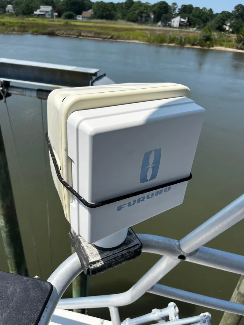 Slide: The Image of Furuno marine radar on NorthCoast 24 Express Sportfish, 1988, near a riverbank. - 19