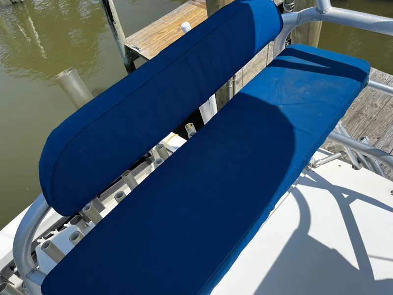 Slide: The Image of Blue cushioned seat on 1988 NorthCoast 24 Express Sportfish boat. - 21