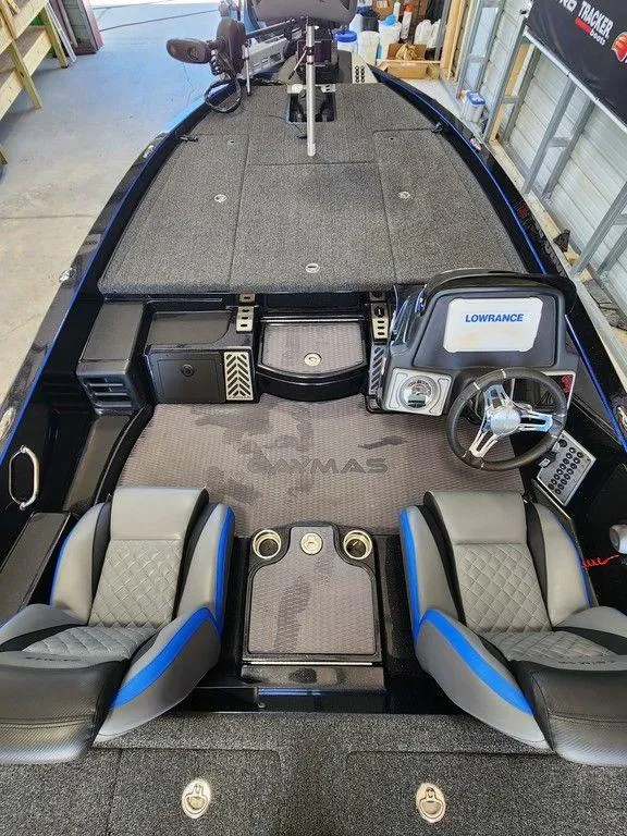 Slide: The Image of 2020 Caymas CX 20 boat interior with Lowrance electronics and dual seats. - 11