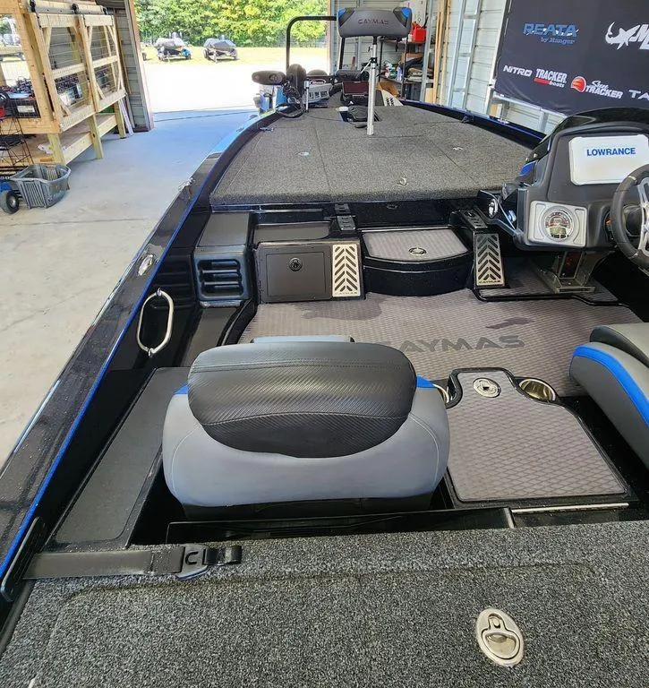 Slide: The Image of 2020 Caymas CX 20 bass boat interior with fishing deck and Lowrance electronics. - 14